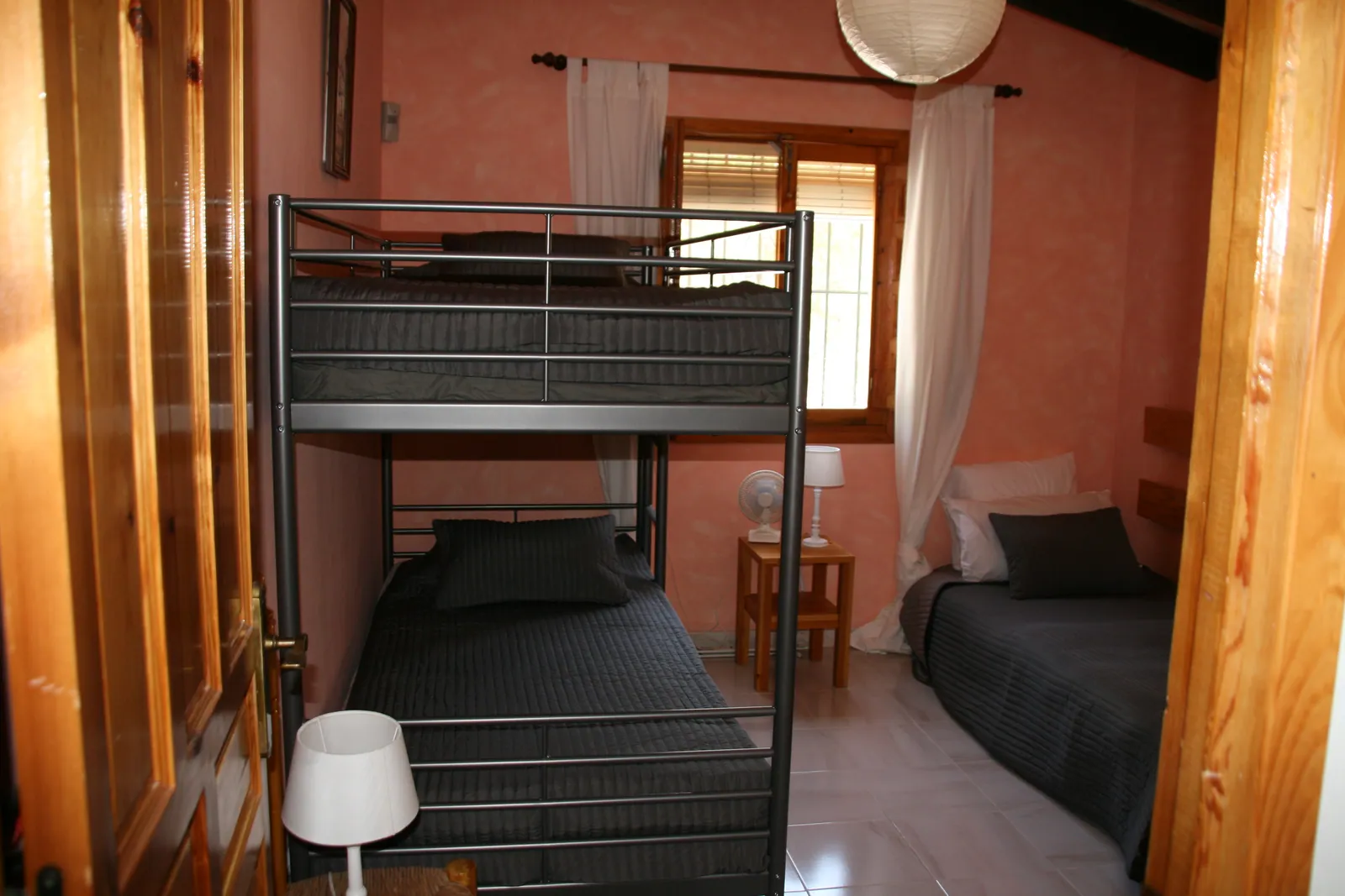 Second bedroom with bunk bed and single bed