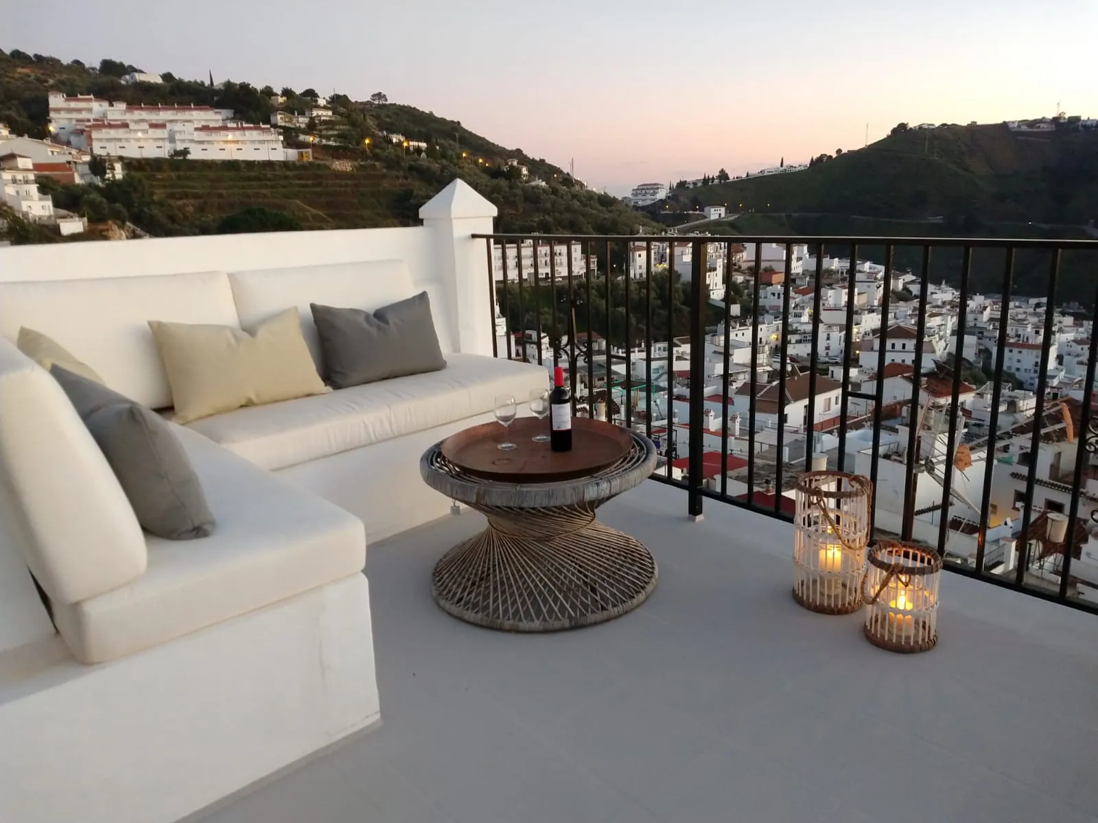 Rooftop seating above the white village